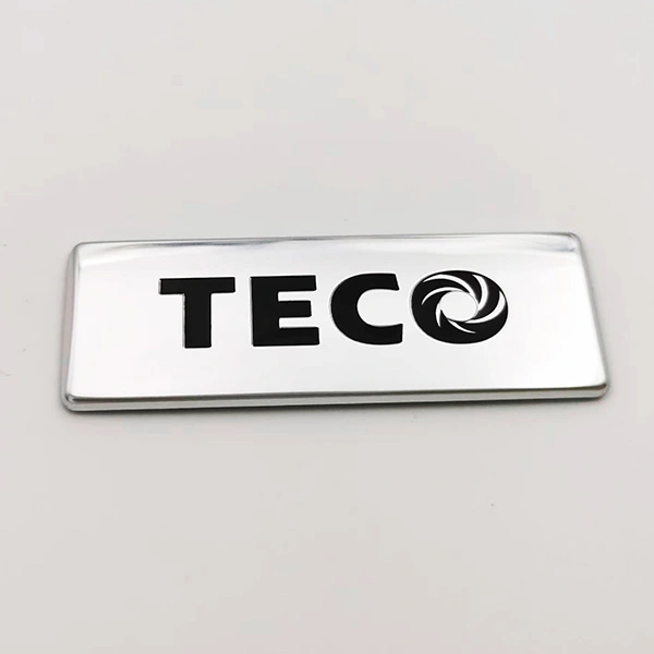 Plaque de nom en métal logo