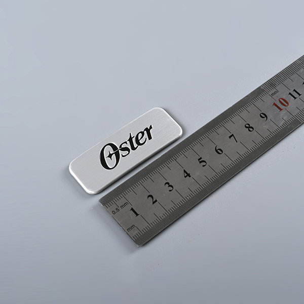 Logo gravé en métal Tags