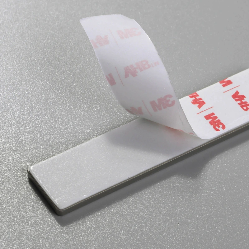 Badge en zinc chromé pour machine à laver