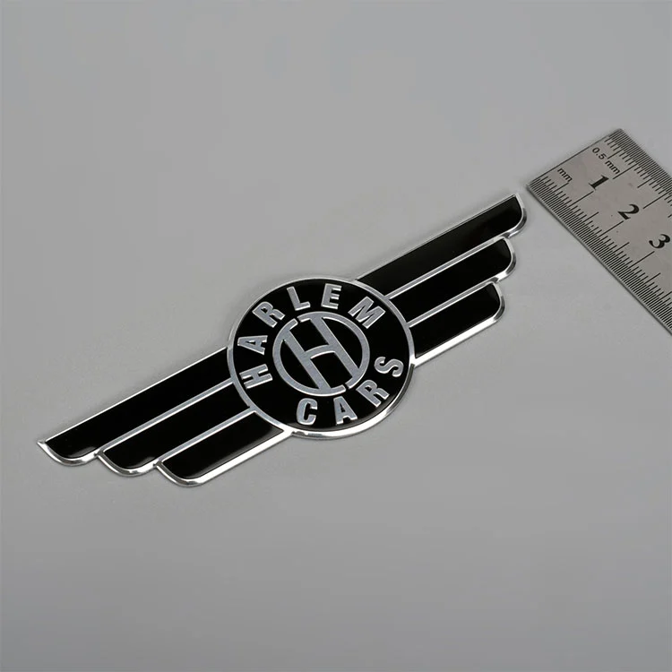 Autocollant de logo en acier inoxydable